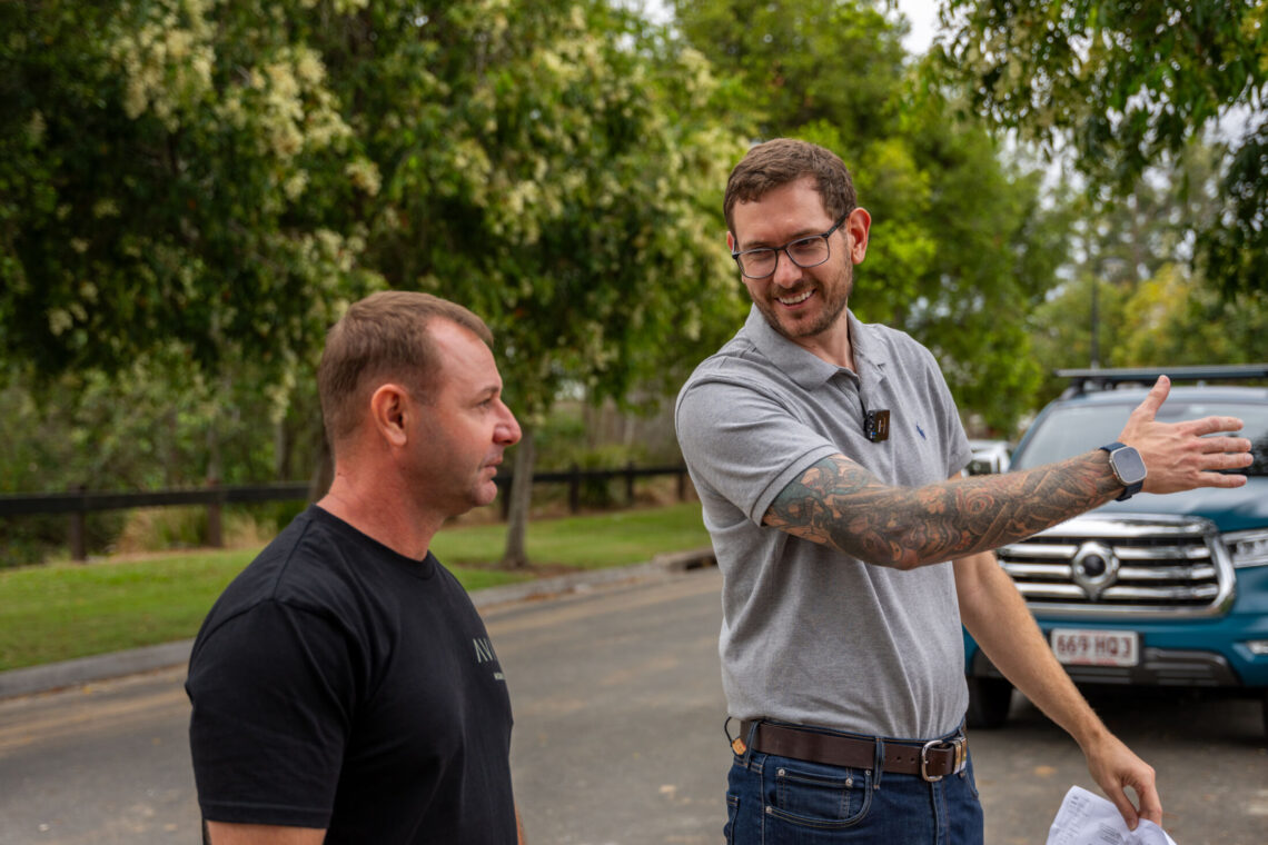 Avia Homes Director, Tom and Avia Homes' building manager inspecting a block of land