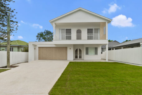 Stunning two-storey custom home facade with modern architectural design